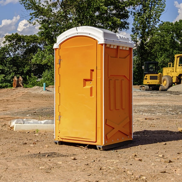 what is the cost difference between standard and deluxe portable restroom rentals in Adamsburg